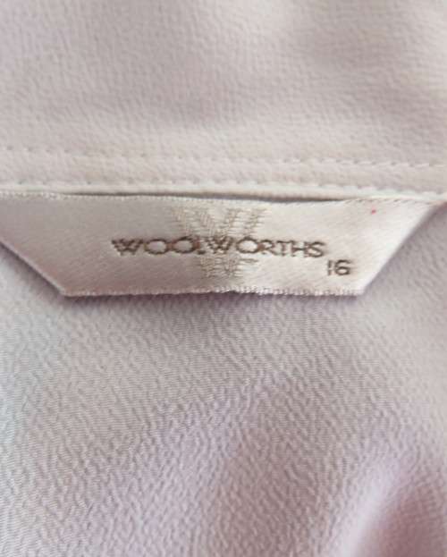 Classic white button down blouse with open collar and elbow length sleeves.Size 40/16.WOOLWORTHS