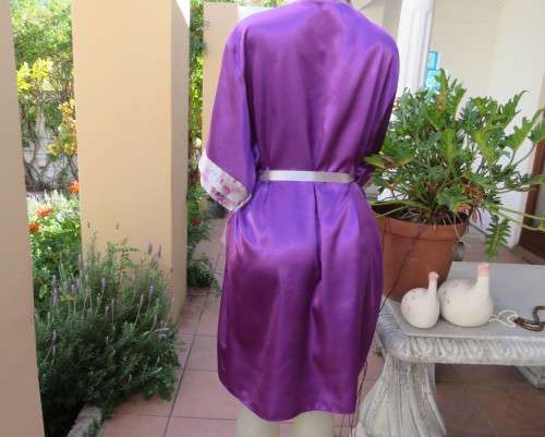 Cool purple short sleeve silky polyester fold over night gown. Silver with bird pattern edging.XL