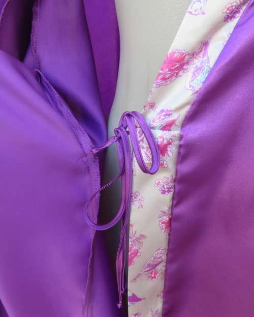 Cool purple short sleeve silky polyester fold over night gown. Silver with bird pattern edging.XL