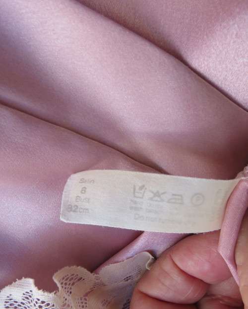 Dainty satin polyester dusty pink fold over size 32/8 night gown with pale pink lace.Tiny sleeves
