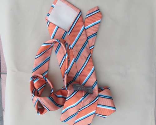 Beautiful textured polyester coral/blue/white neck tie. Width 8.5.By CIGNAL.Diagonal stripes.As new