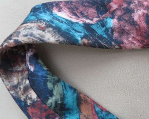 Modern narrow silky polyester neck tie in array of beautiful colours. Width 5cm. New condition