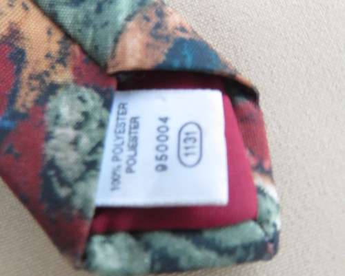 Modern narrow silky polyester neck tie in array of beautiful colours. Width 5cm. New condition