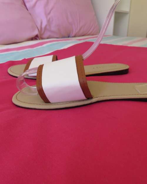 Comfy pair slip-on`s in size 8 by AUDACITY. With wide tan/cream strap over foot. New condition