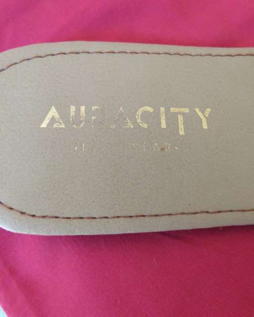 Comfy pair slip-on`s in size 8 by AUDACITY. With wide tan/cream strap over foot. New condition