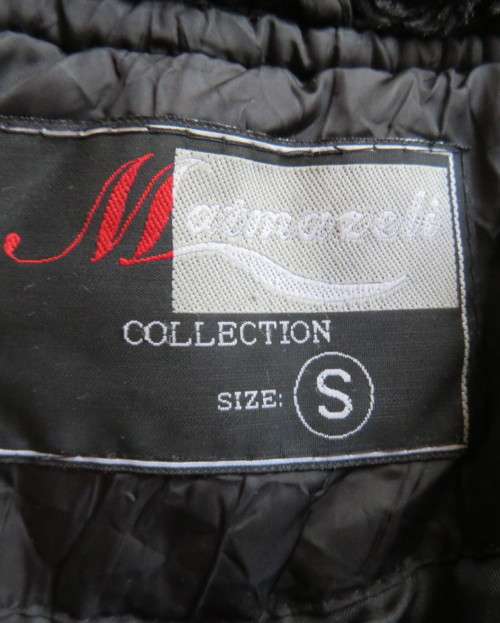High fashion black long sleeve warm padded jacket size 32 to 34 by MATMAZELI. Faux fur collar/fronts