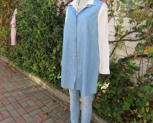 Versatile light blue denim 100% cotton long loose top with hidden button down.Size 38/14.
