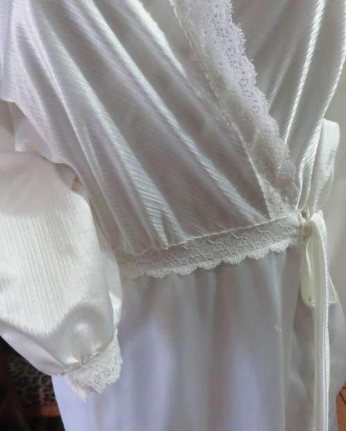 This elegant sexy white ESTELLE floor length night gown in shiny nylon. Size 34 to 36. As new