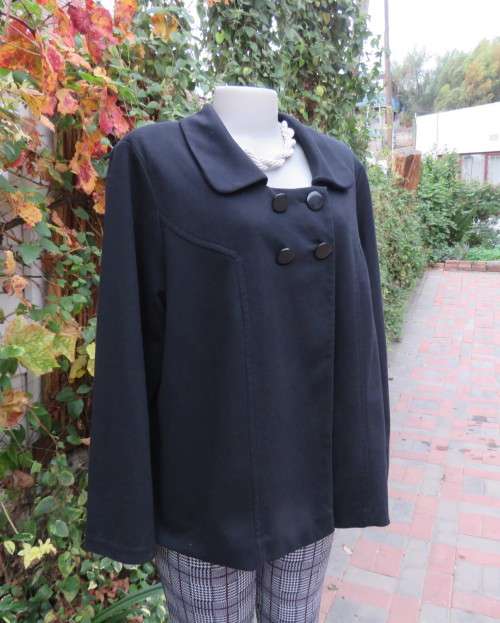 Stunning warm black swing fully lined double breast jacket with rounded collar.Size 48/24 by DONNA-C