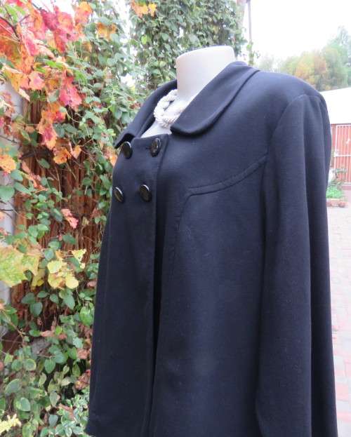 Stunning warm black swing fully lined double breast jacket with rounded collar.Size 48/24 by DONNA-C