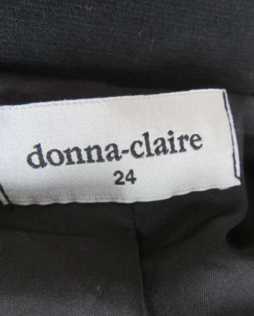 Stunning warm black swing fully lined double breast jacket with rounded collar.Size 48/24 by DONNA-C