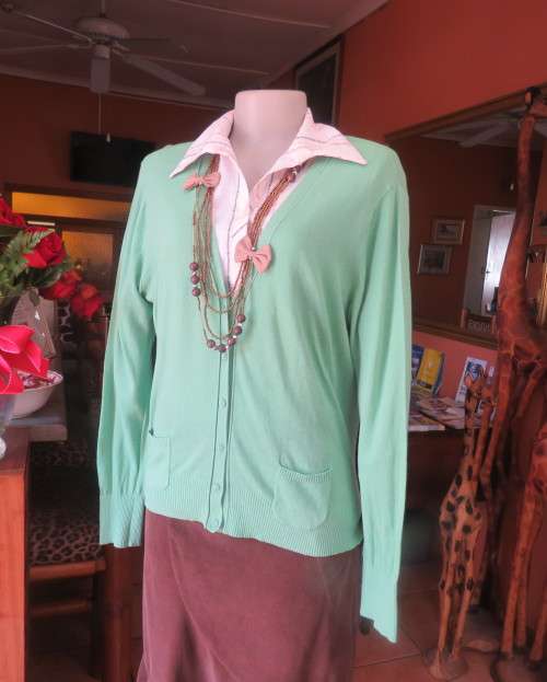 Fabulous light weight 100% cotton long sleeve poison green button down cardigan.Size 38/14..A