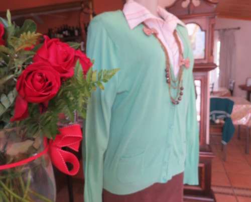 Fabulous light weight 100% cotton long sleeve poison green button down cardigan.Size 38/14..A