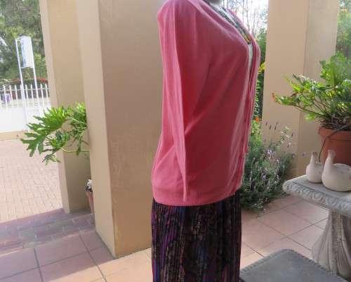 Handy light weight 100% cotton knit crimson long sleeve cardigan with V front.By WOOLWORTHS size 40