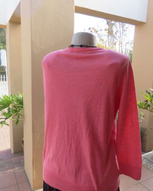 Handy light weight 100% cotton knit crimson long sleeve cardigan with V front.By WOOLWORTHS size 40