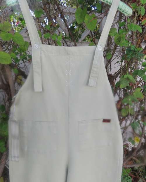 Cheeky mint green dungaree with 2 front pockets,bib and shoulder straps. Size 30/8 by LA LUNA.As new
