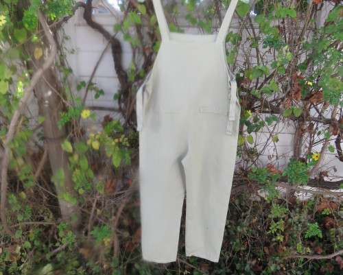 Cheeky mint green dungaree with 2 front pockets,bib and shoulder straps. Size 30/8 by LA LUNA.As new