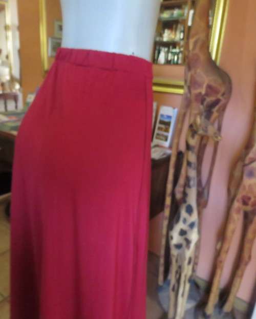 Ankle length cherry red stretch cotton skirt with elasticated waist. Size 32/8. A-Line. Rounded seam