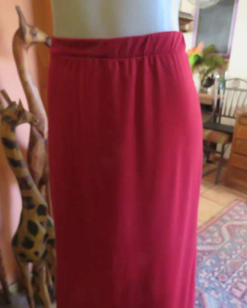 Ankle length cherry red stretch cotton skirt with elasticated waist. Size 32/8. A-Line. Rounded seam