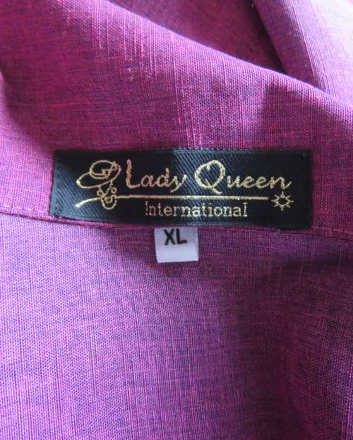 Feel sensational in this shiny short sleeve jacket in shades of pink/purple.Size 40 to 42. New cond.