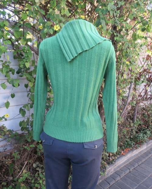 Beautiful styled forest green soft acrylic knitted long sleeve pullover.Open polo neck collar. 36/12