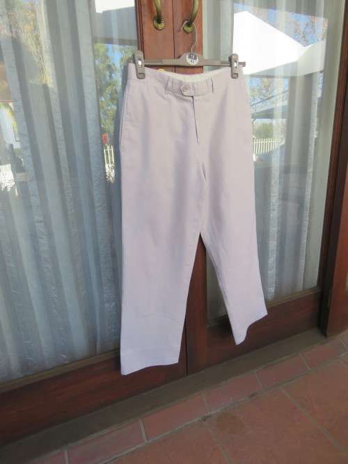Men`s beige linen/cotton pants in size 30 by D66. Pockets back and sides. Flat front. Very good cond