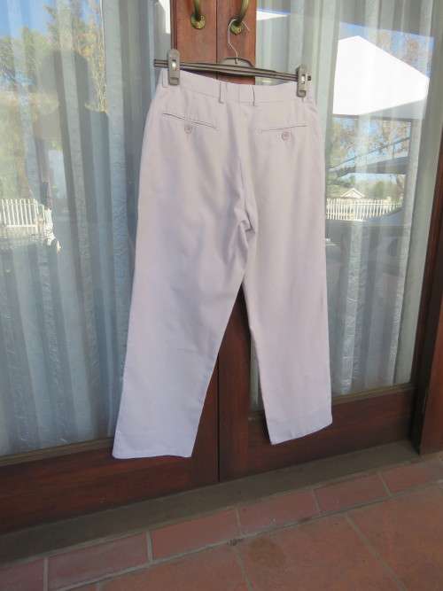 Men`s beige linen/cotton pants in size 30 by D66. Pockets back and sides. Flat front. Very good cond