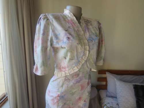 Strapless figure hugging tasteful printed special occasion long dress and bolero size 36/12 As new.