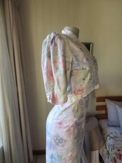 Strapless figure hugging tasteful printed special occasion long dress and bolero size 36/12 As new.