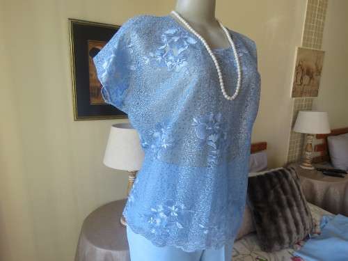 Skyblue 3 pc pant suit. Ankle ants,lace slip over top and short sleeve jacket.Size 40.By SALLY FAYE