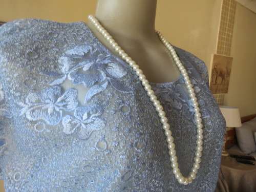 Skyblue 3 pc pant suit. Ankle ants,lace slip over top and short sleeve jacket.Size 40.By SALLY FAYE