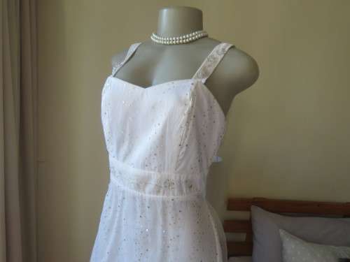 Pretty white strappy evening dress with glitter/embellishment.High/low seamline.Size 36 by GERANO