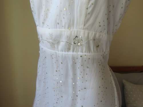 Pretty white strappy evening dress with glitter/embellishment.High/low seamline.Size 36 by GERANO