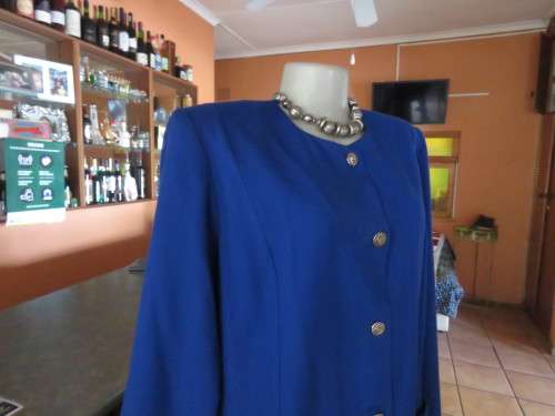 Beautiful structured long sleeve royal blue button down jacket.Collarless.By SEGAL.Size 42/18.As new