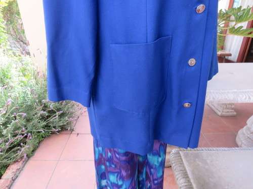 Beautiful structured long sleeve royal blue button down jacket.Collarless.By SEGAL.Size 42/18.As new