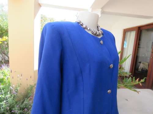 Beautiful structured long sleeve royal blue button down jacket.Collarless.By SEGAL.Size 42/18.As new