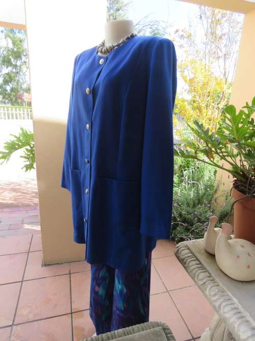 Beautiful structured long sleeve royal blue button down jacket.Collarless.By SEGAL.Size 42/18.As new