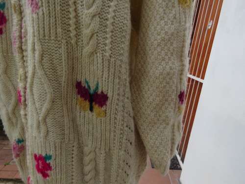 Bulky knit cream DOMBEYA  KNIT button down cardigan with red/pink flowers.Size 46/22.