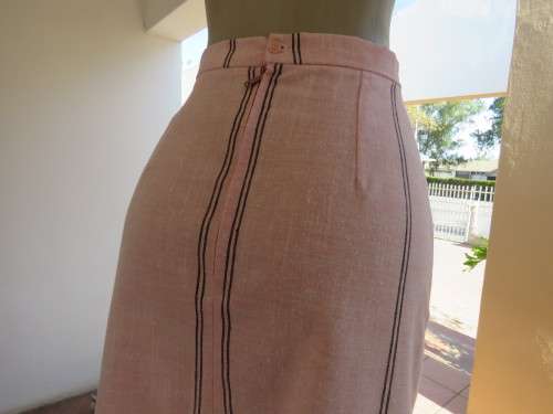 Elegant light pink/black vertical stripe pencil skirt in poly/linen blend. Size 33/9 .Zip at back.