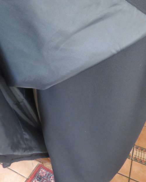 Top of the line black cross over fully lined honeycomb polyester size 38 skirt by WOOLWORTHS.As new