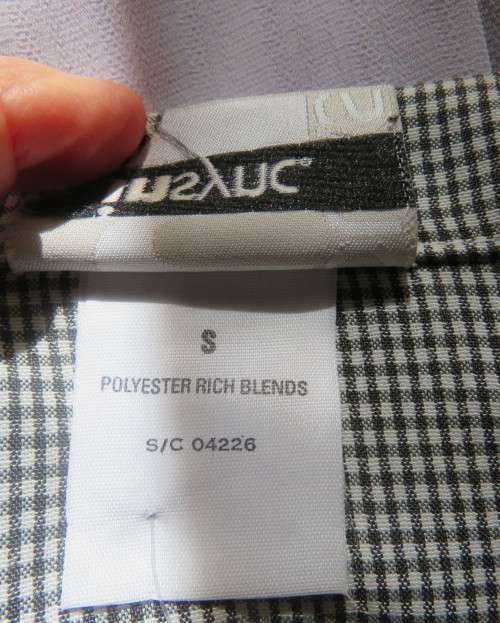 Practical black and white check long sleeve shirt. Button down with open collar. Size 34/10.As new
