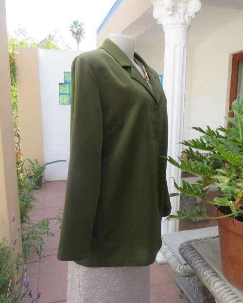 Fabulous olive green long sleeve jacket with hidden button down front.By MILADY`S size 38/14.As new