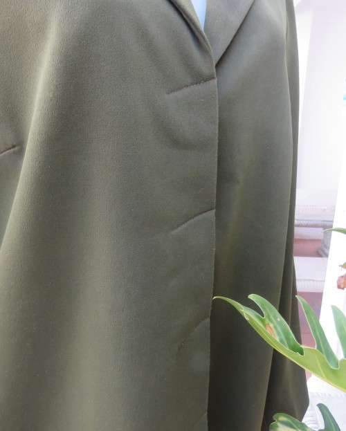 Fabulous olive green long sleeve jacket with hidden button down front.By MILADY`S size 38/14.As new