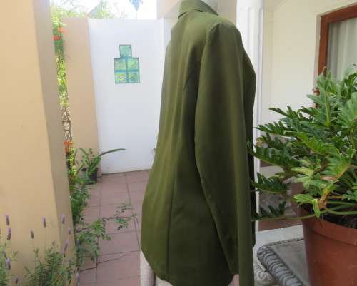 Fabulous olive green long sleeve jacket with hidden button down front.By MILADY`S size 38/14.As new