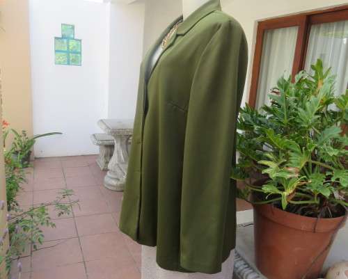 Fabulous olive green long sleeve jacket with hidden button down front.By MILADY`S size 38/14.As new