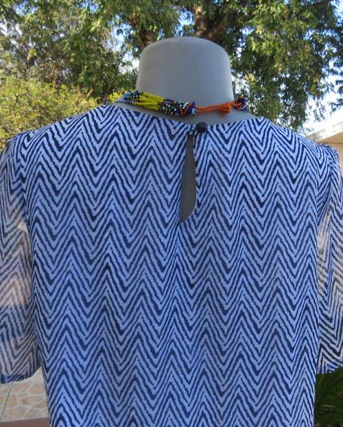 Dainty sheer polyester white with navy zig zag pattern blouson fully lined top size 32/8 by MILADY`S
