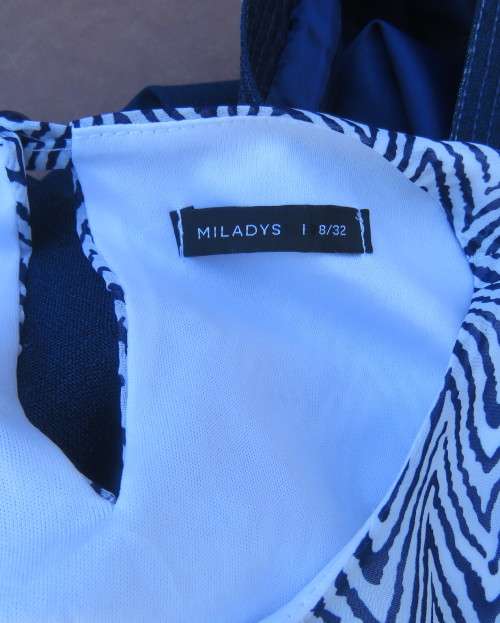Dainty sheer polyester white with navy zig zag pattern blouson fully lined top size 32/8 by MILADY`S