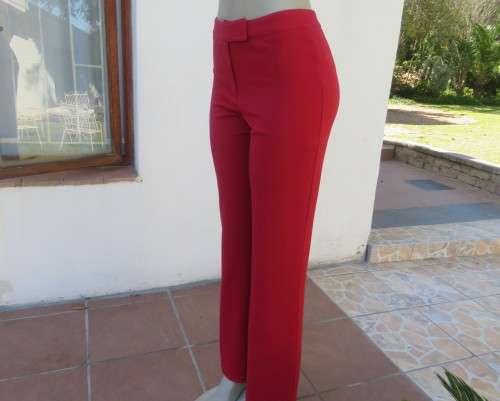Ultra sexy cherry red stretch corded polyester pants size 34/10 by TRUWORTHS.No pockets.New cond.