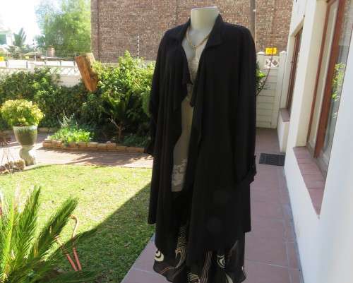 Stunning long black waterfall style loose hanging jacket.Spotless.As new.Bracelet sleeves.Size 42/18