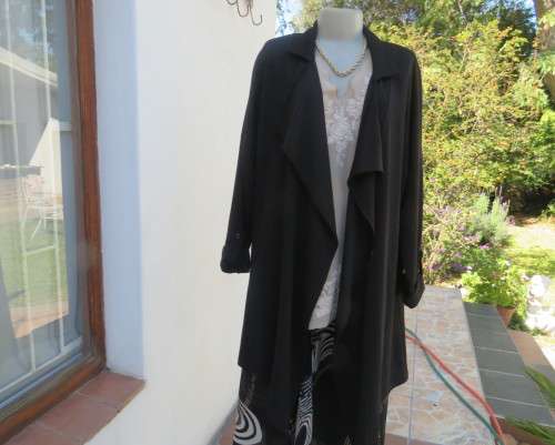 Stunning long black waterfall style loose hanging jacket.Spotless.As new.Bracelet sleeves.Size 42/18